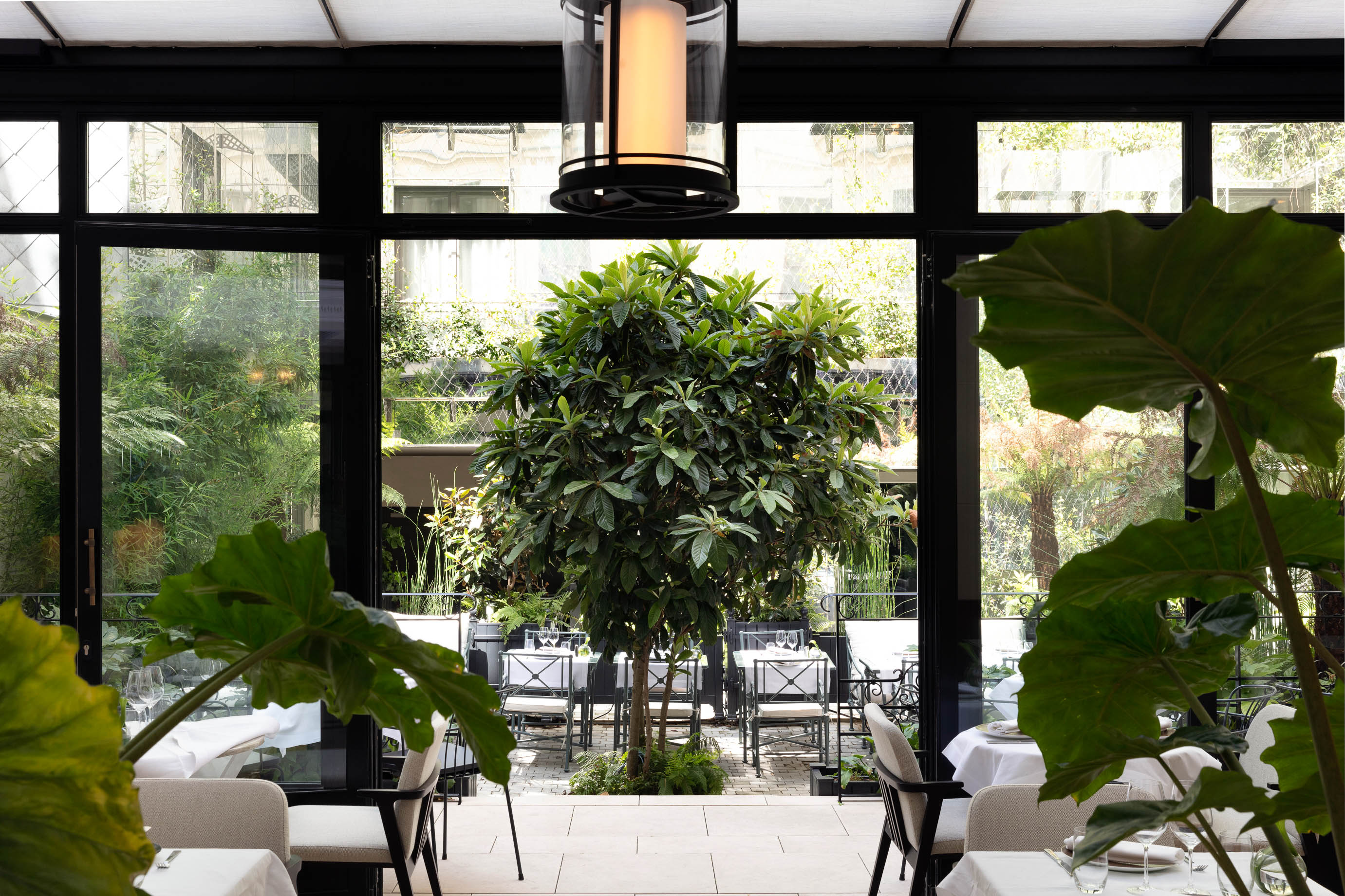 garden view from the bistronomic restaurant at the Les Jardins du Faubourg hotel, near the Champs-Elysées in Paris